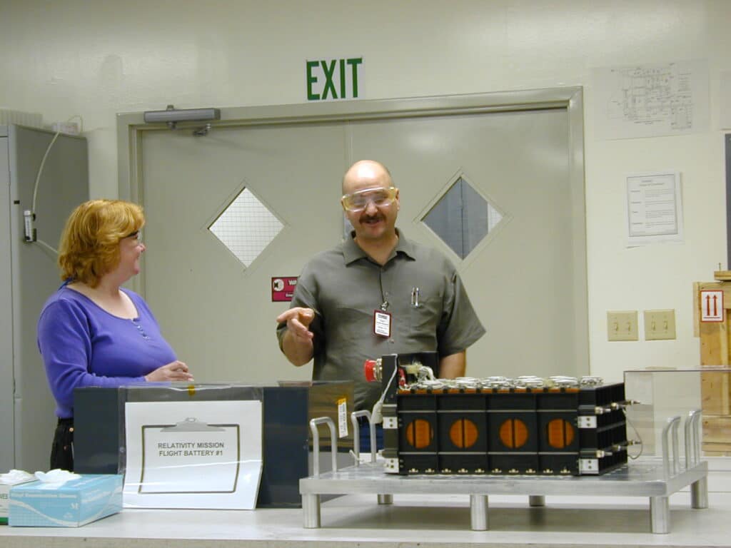 Lead Quality Technician Suzy G. and Customer Discussing the Buy-Off - Flight Battery #1 of 2 Shown - NASA Contract NAS-8-39225