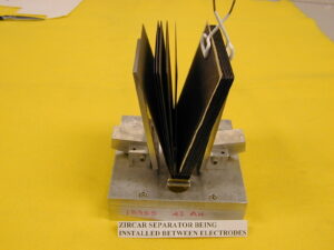 Spacecraft Battery Cell Pack - Inverted view after TIG welding positive and negative terminals to combs - AWS CWI Certified Process