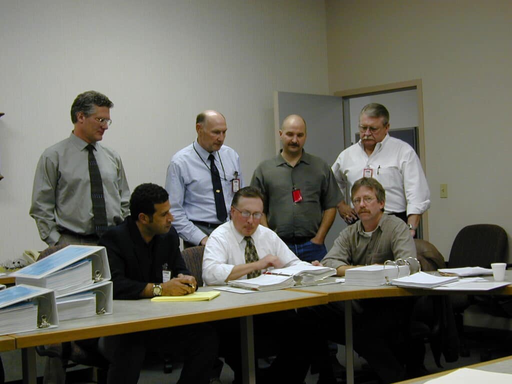 Eagle-Picher Project Engineer Jeff H., NASA MSFC Eric Foulk, Lockheed Shawky Shehata, and Buy-Off Team reviewing Final Acceptance Data Package